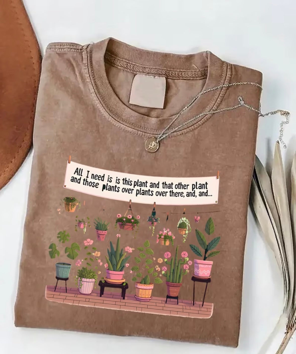 All I need is this plant and… shirt