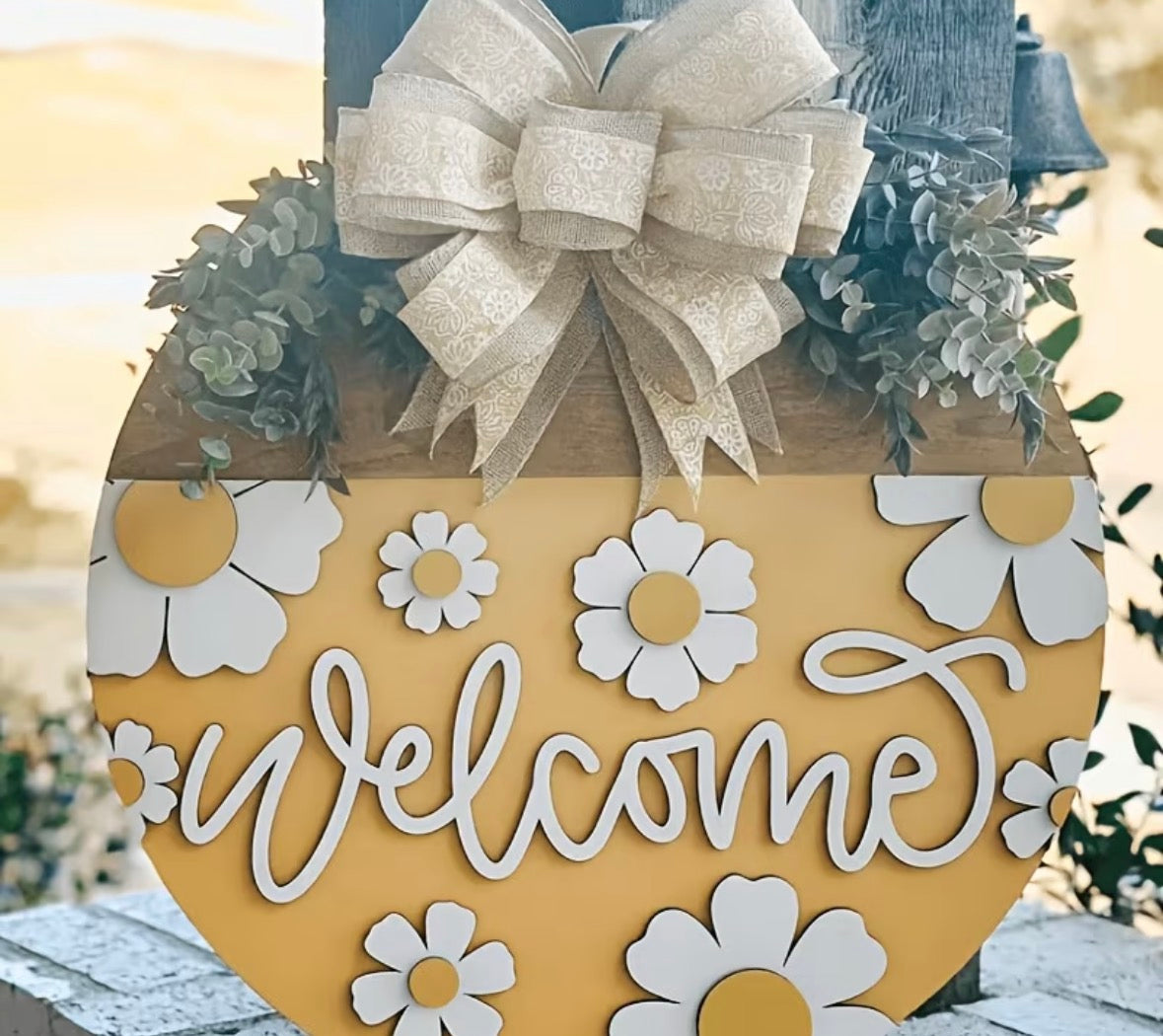 Flowers and welcome sign